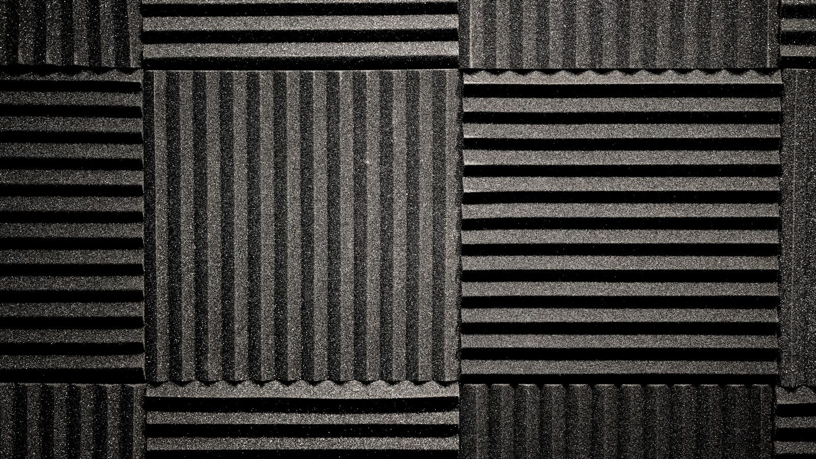a black and white photo of a wall made of corrugated