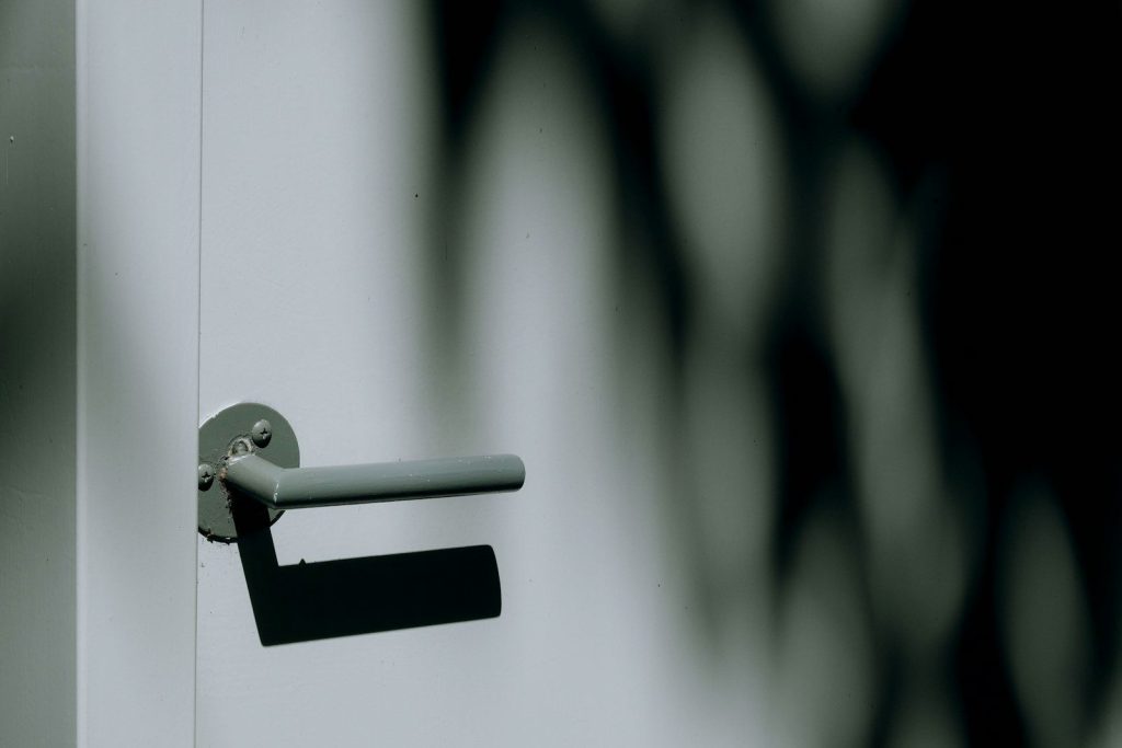 gray metal door lever