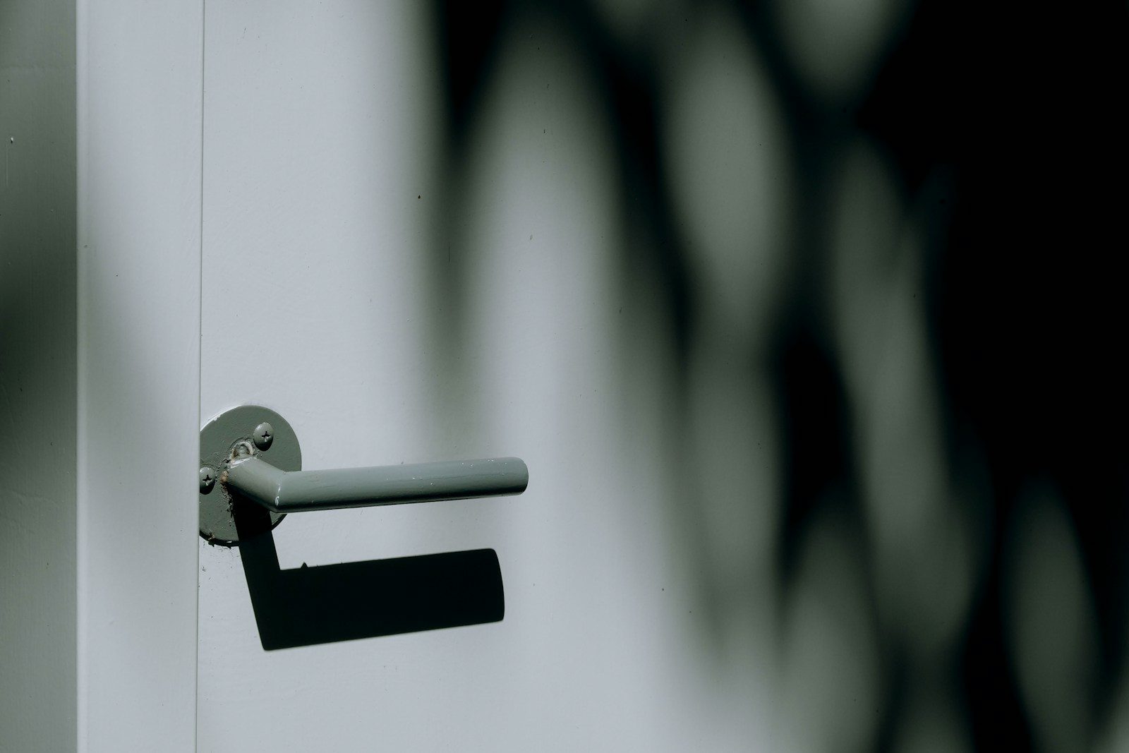gray metal door lever